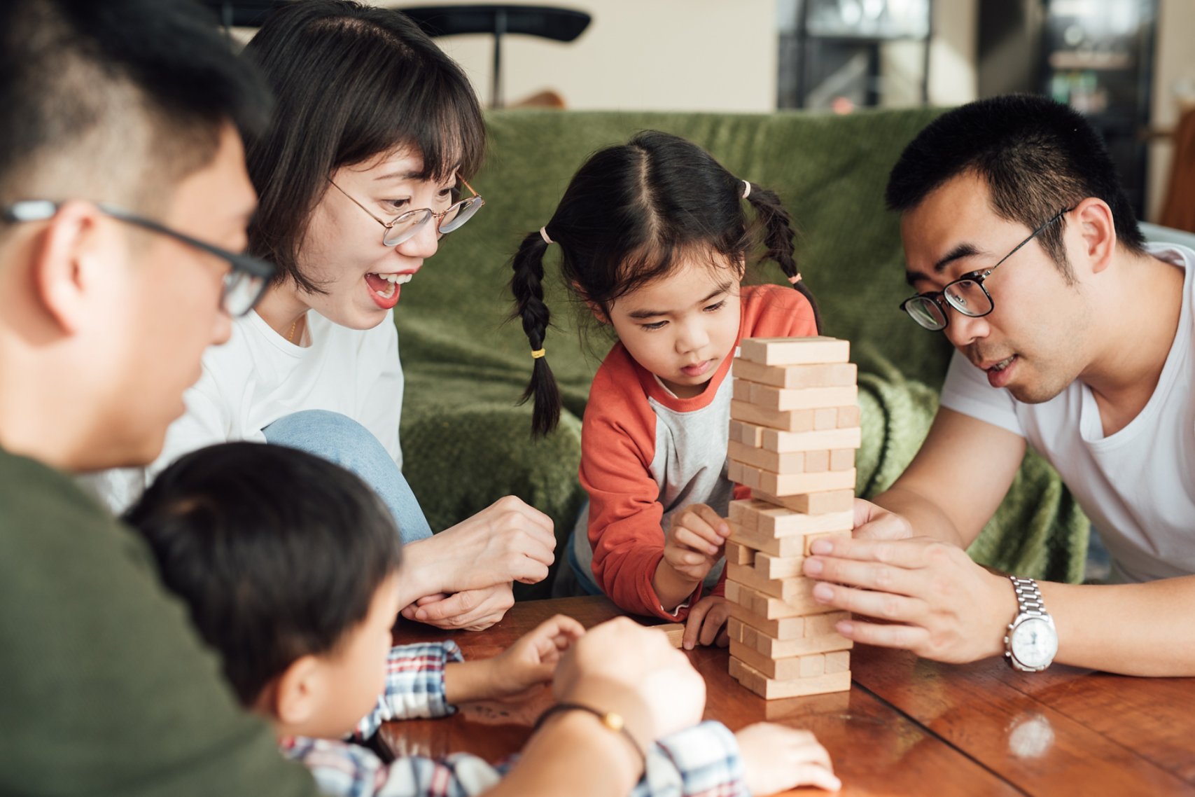 A family playing jenga