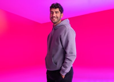 Man Wearing a Jacket with Pink Background