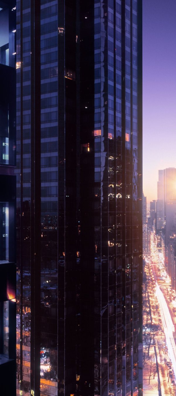 An exterior view of a workplace with glimpses through the windows