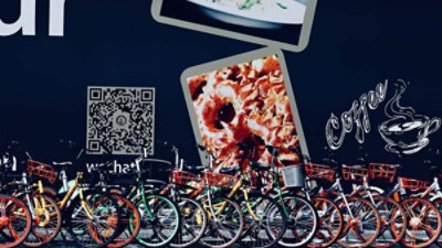 A queue of colorful bicycles in front a cafe.