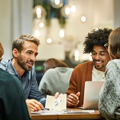 Group discussion on a wooden table