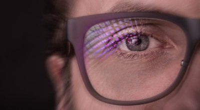 Zoom image of an eye with eyeglass