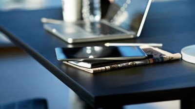 A laptop and a tablet on the table