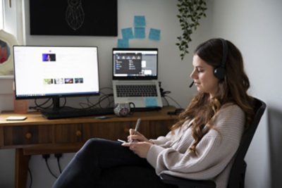 Woman writing on a office room