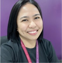 A woman wearing black shirt smiling