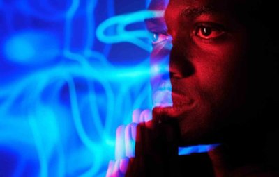 An image of a man with blue lights for Tech Innovation Report 2022