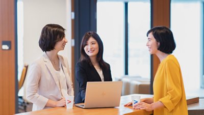 Three beautiful women having a conversation