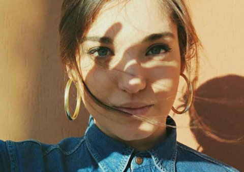 woman with large earings