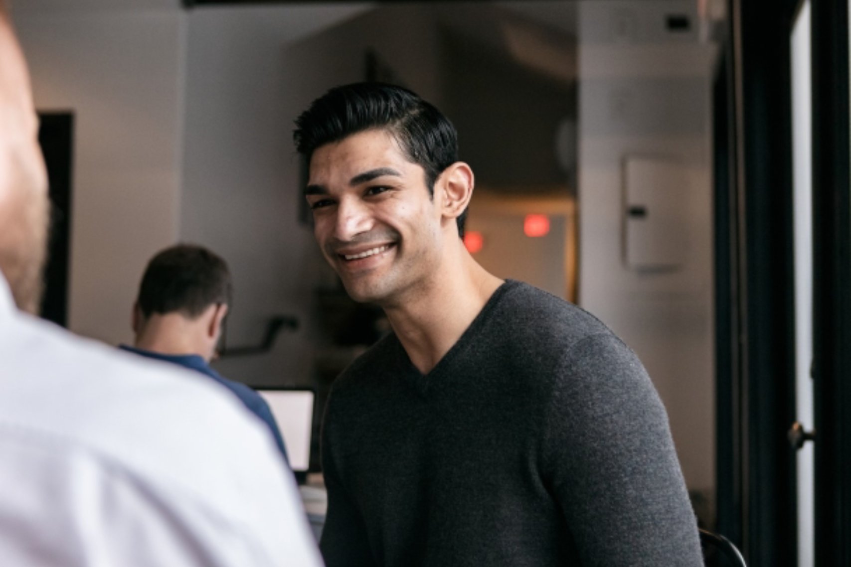 Indian man meeting with another person