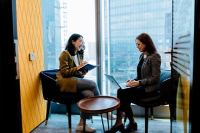 Women discussing in the office