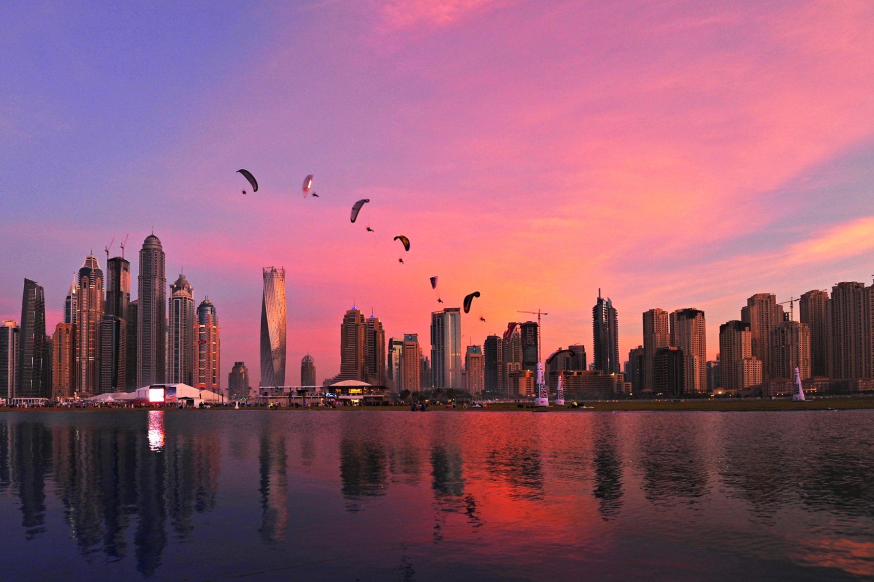 A zoom out building view with sunset color sky 