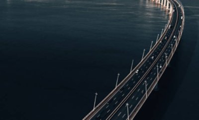 Photograph of a bridge, curved detail, minimal, aerial drone point of view
