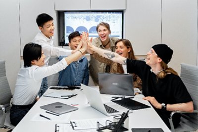 Group of people doing high five