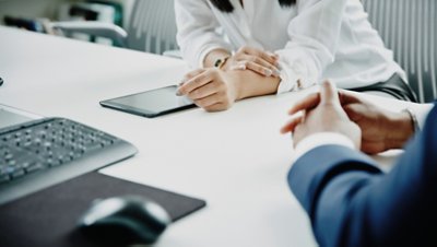 Hands of people in meeting