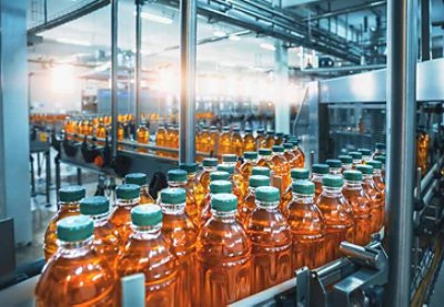 Juice bottles on beverage factory