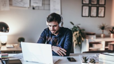 Man with headphones sitting