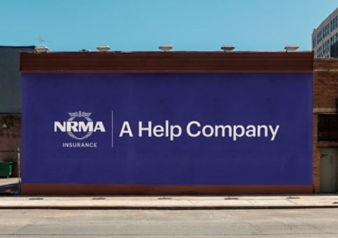 NRMA Insurance billboard with the tagline 'A Help Company'