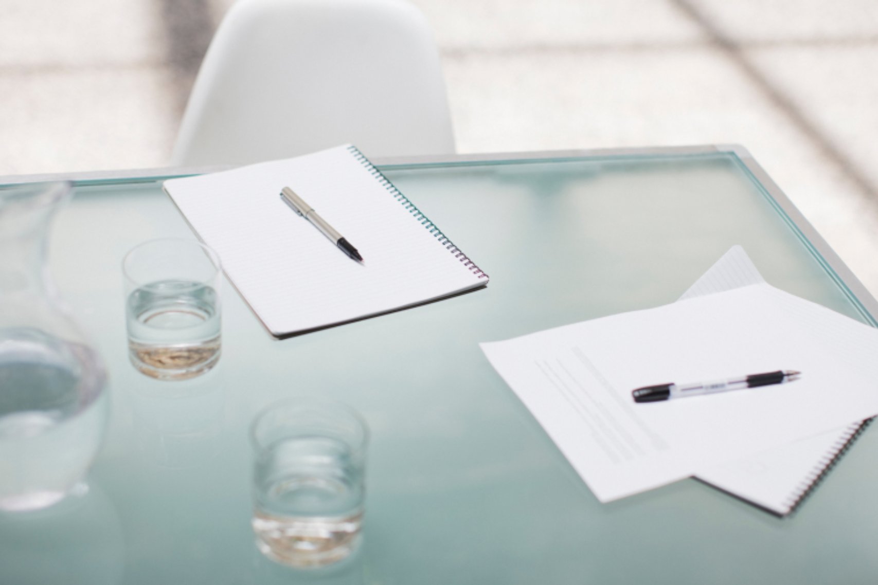 Papers and Pen on The Table