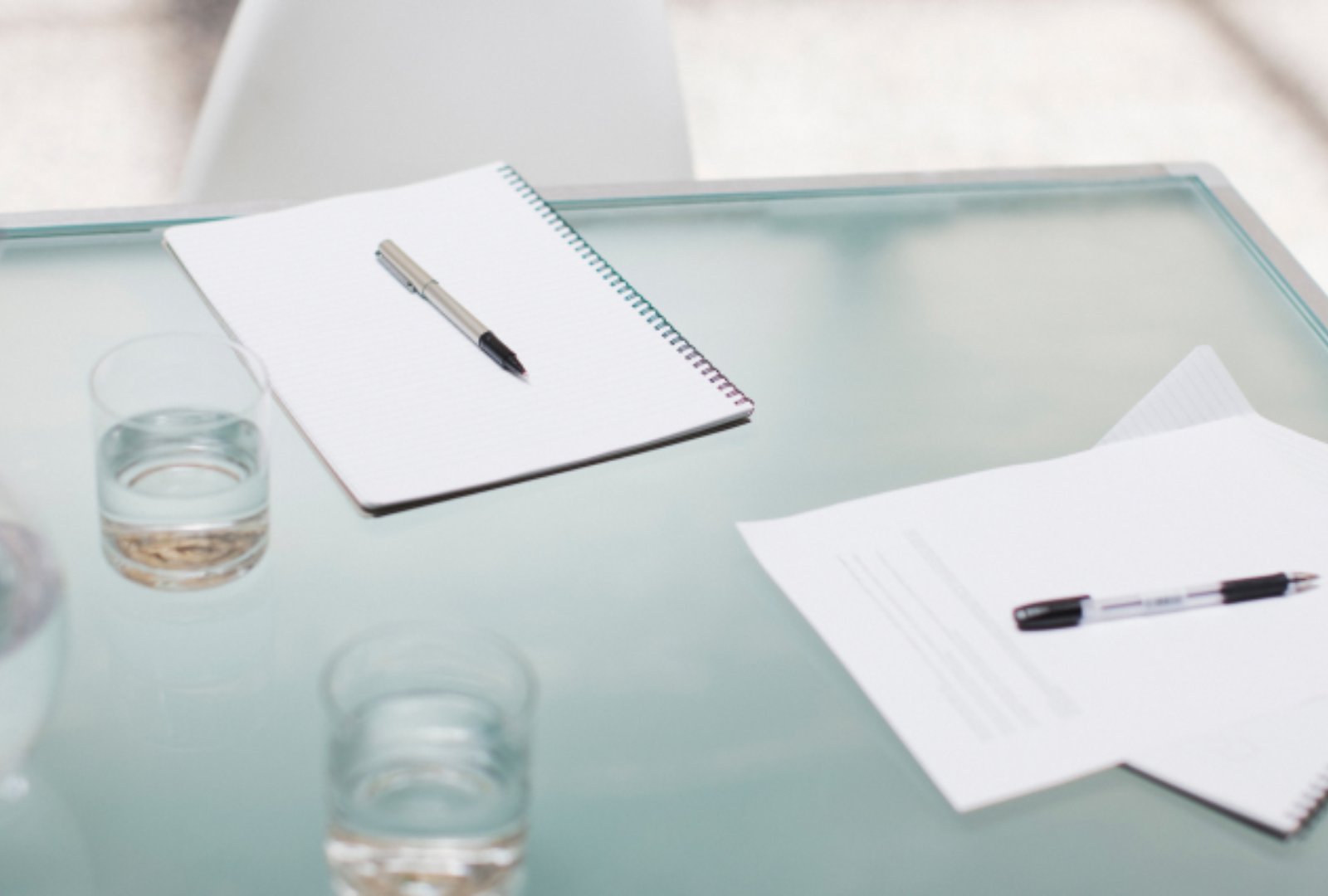 Pen and paper on desk