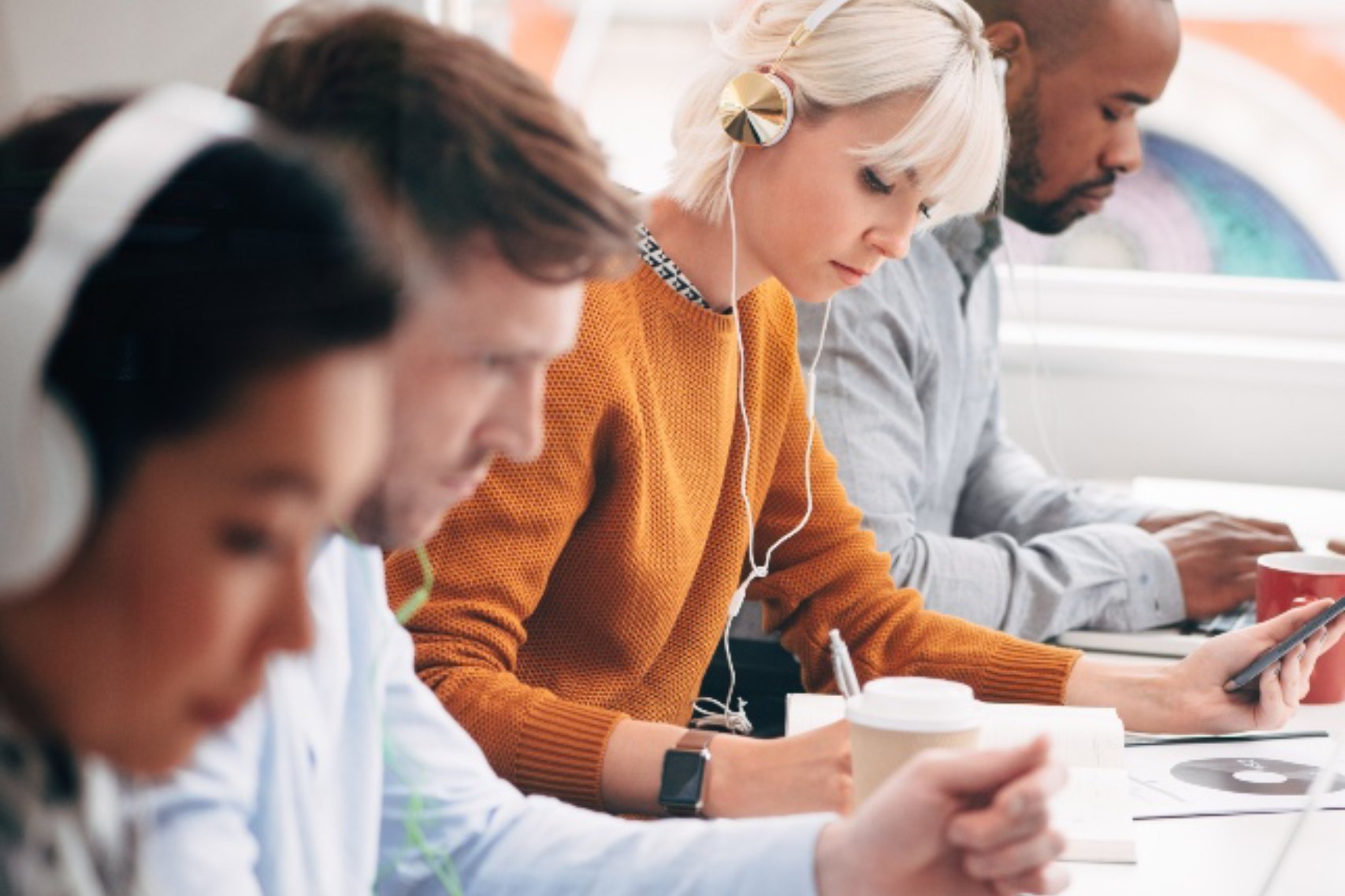 People listening to audio training