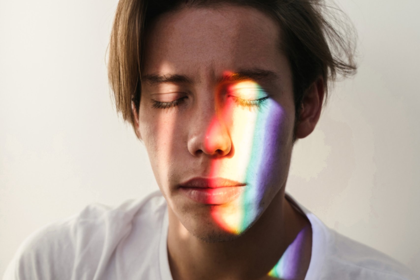 A man with spotlight on face
