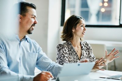 Man And Woman In A Meeting