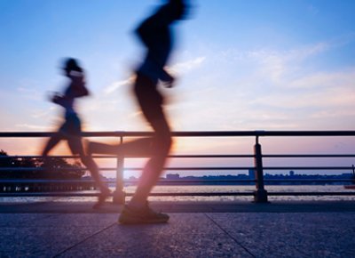 Two People Captured Jogging in Motion