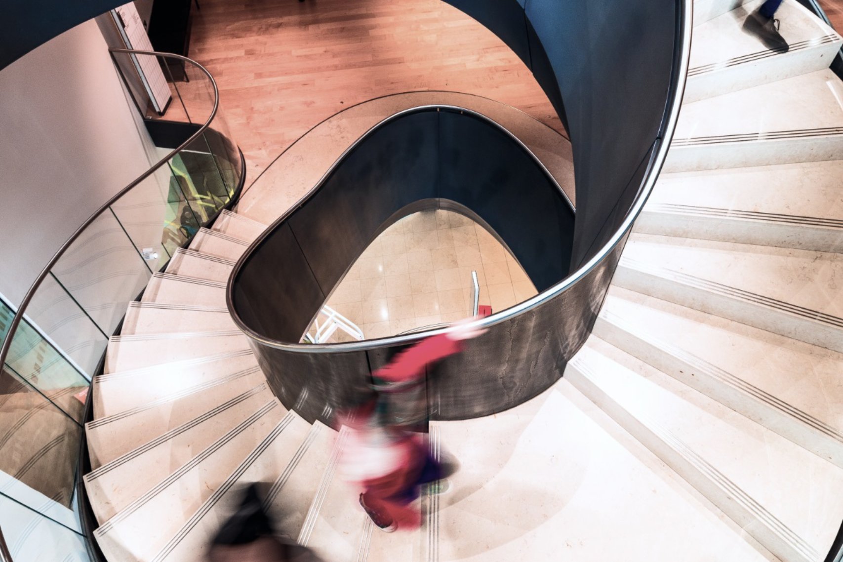 Blurry people walking on stairs