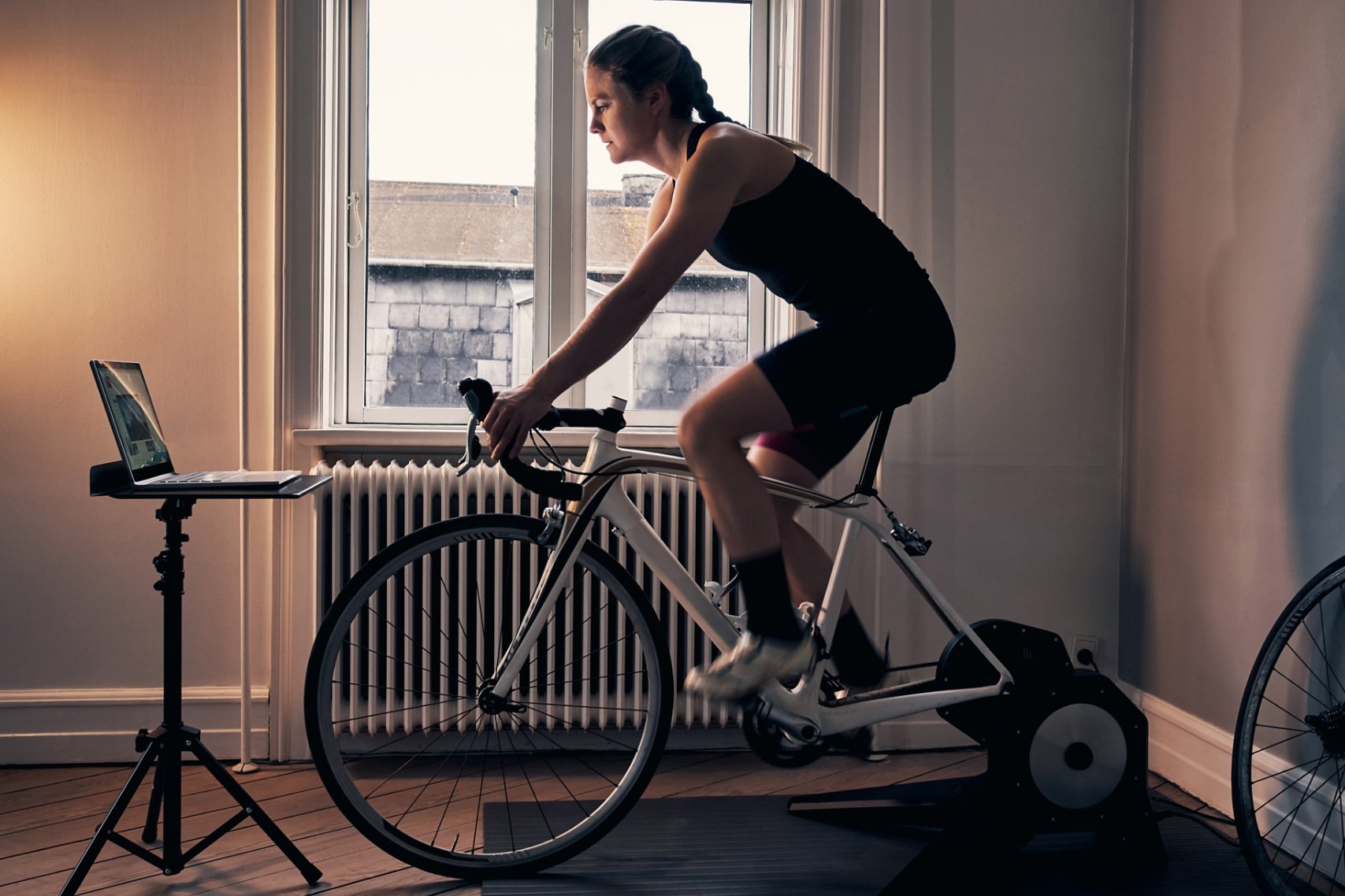 woman riding a stationary bike