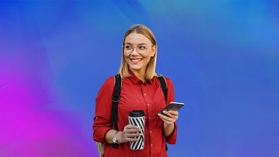 Woman wearing red polo holding tumbler blue and purple background