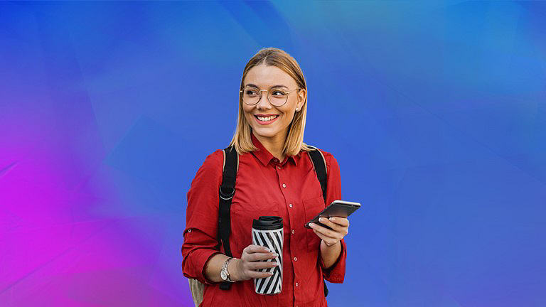 Woman wearing red polo holding tumbler blue and purple background