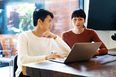 Young business people working laptop