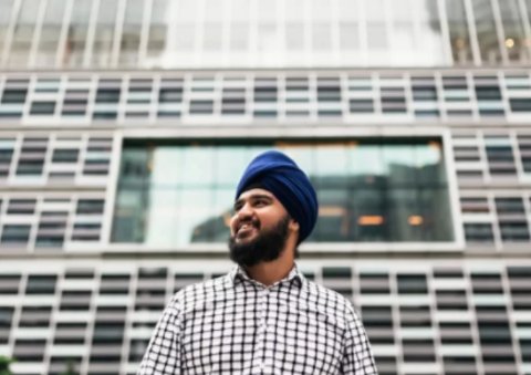 Man standing in front of building