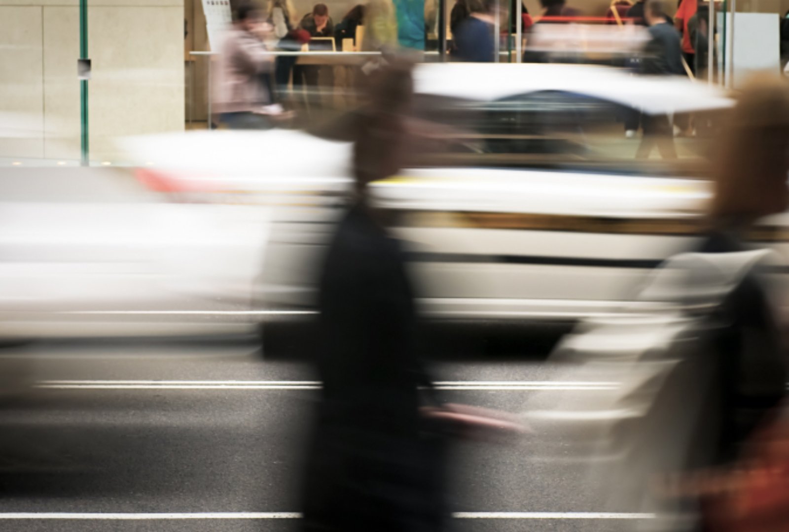 Blurry figures on the street