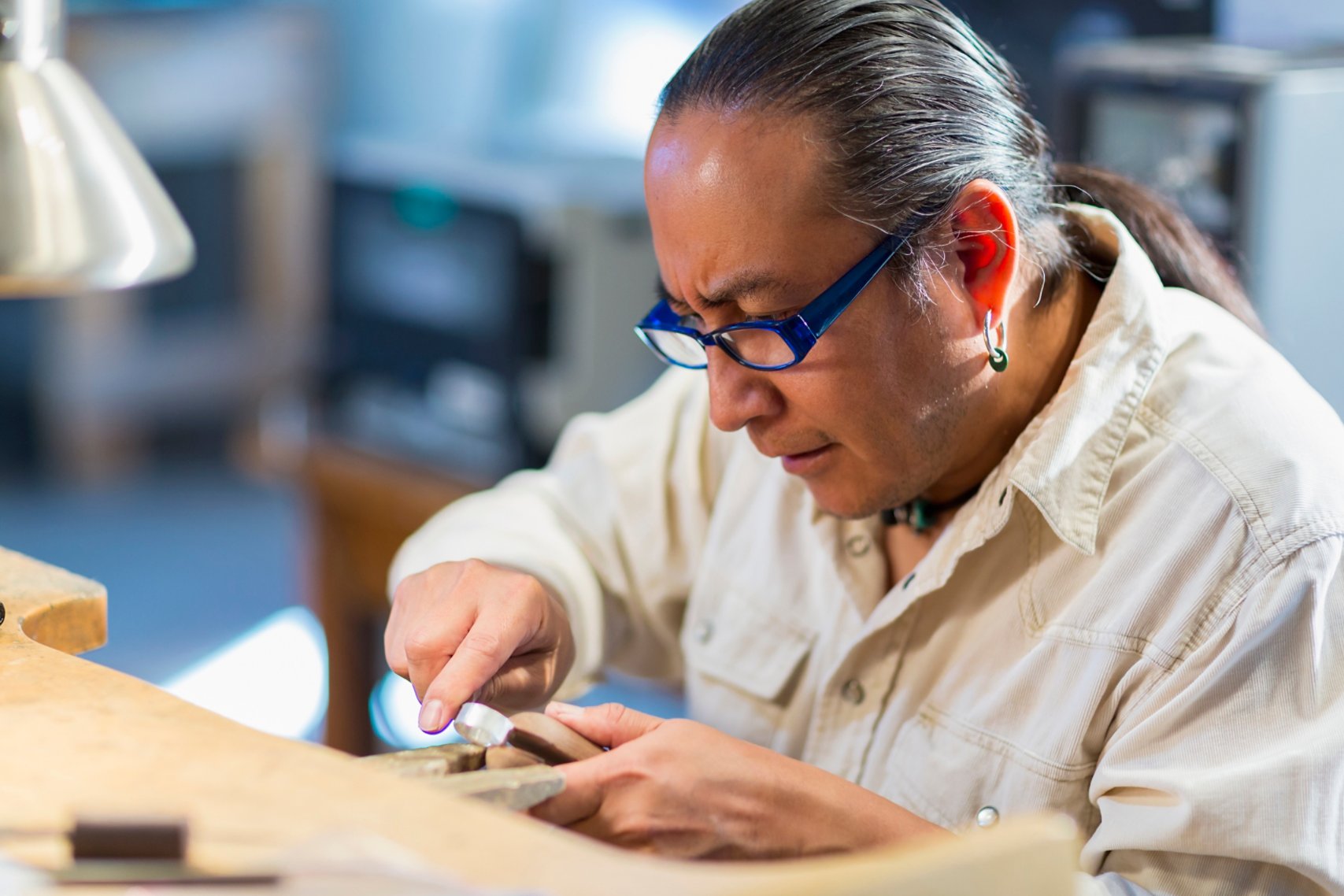 Professional working on jewelry