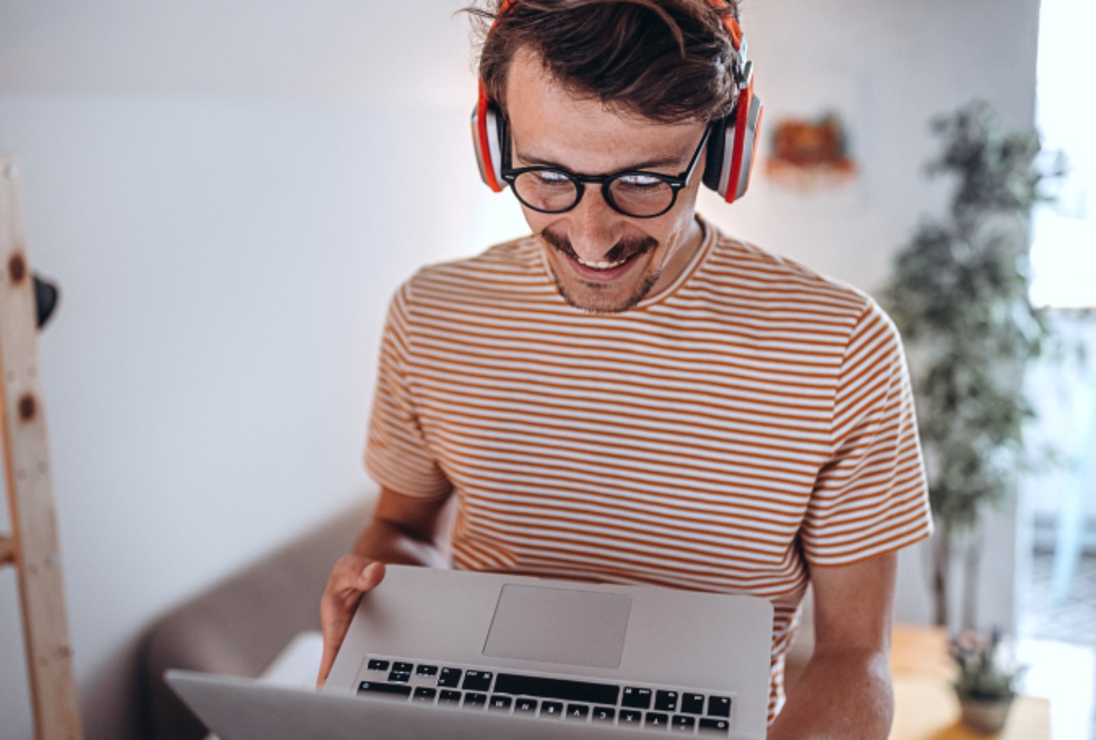 Man standing while working with headset