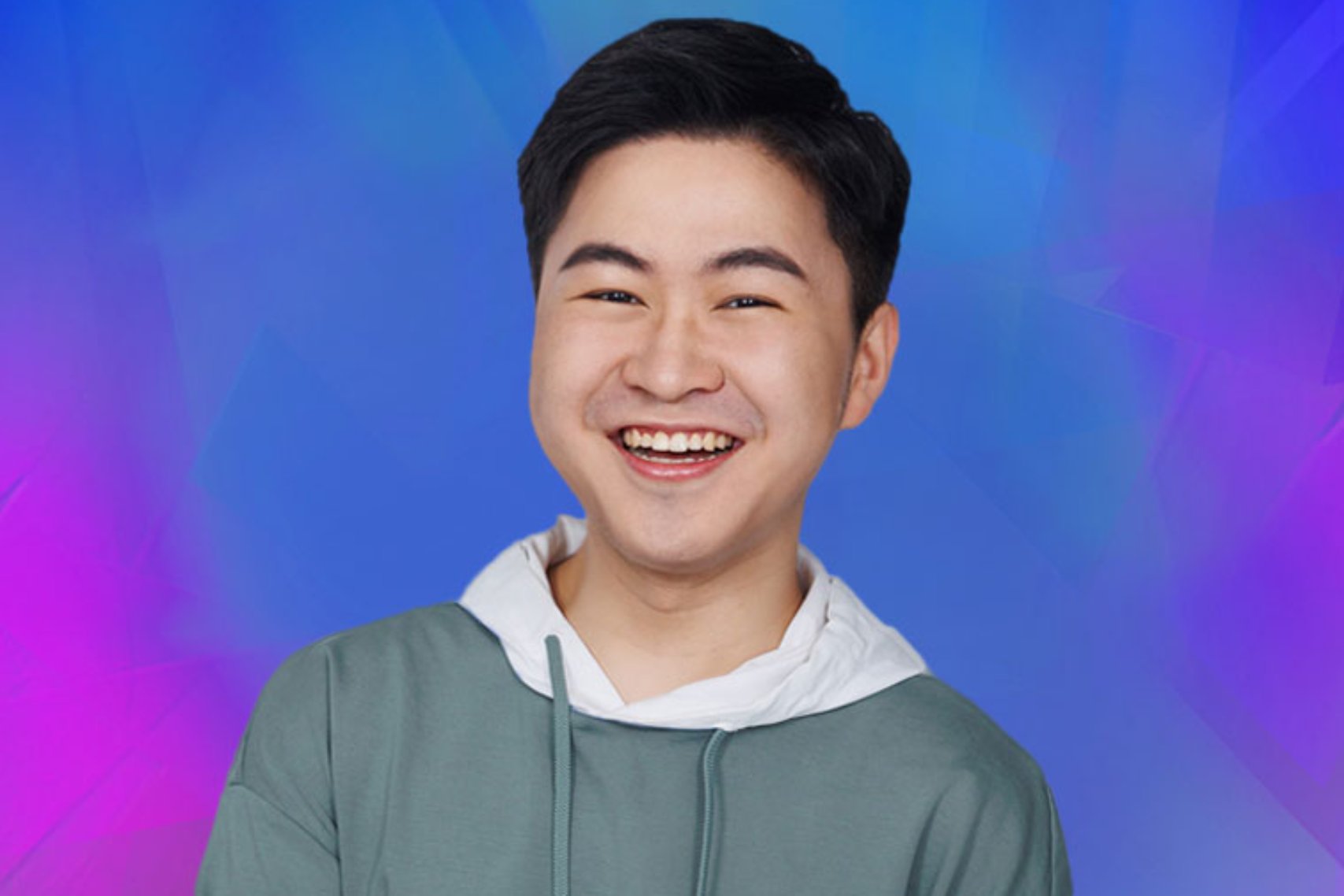 Smiling Guy Wearing Hoodie Blue and Pink Background