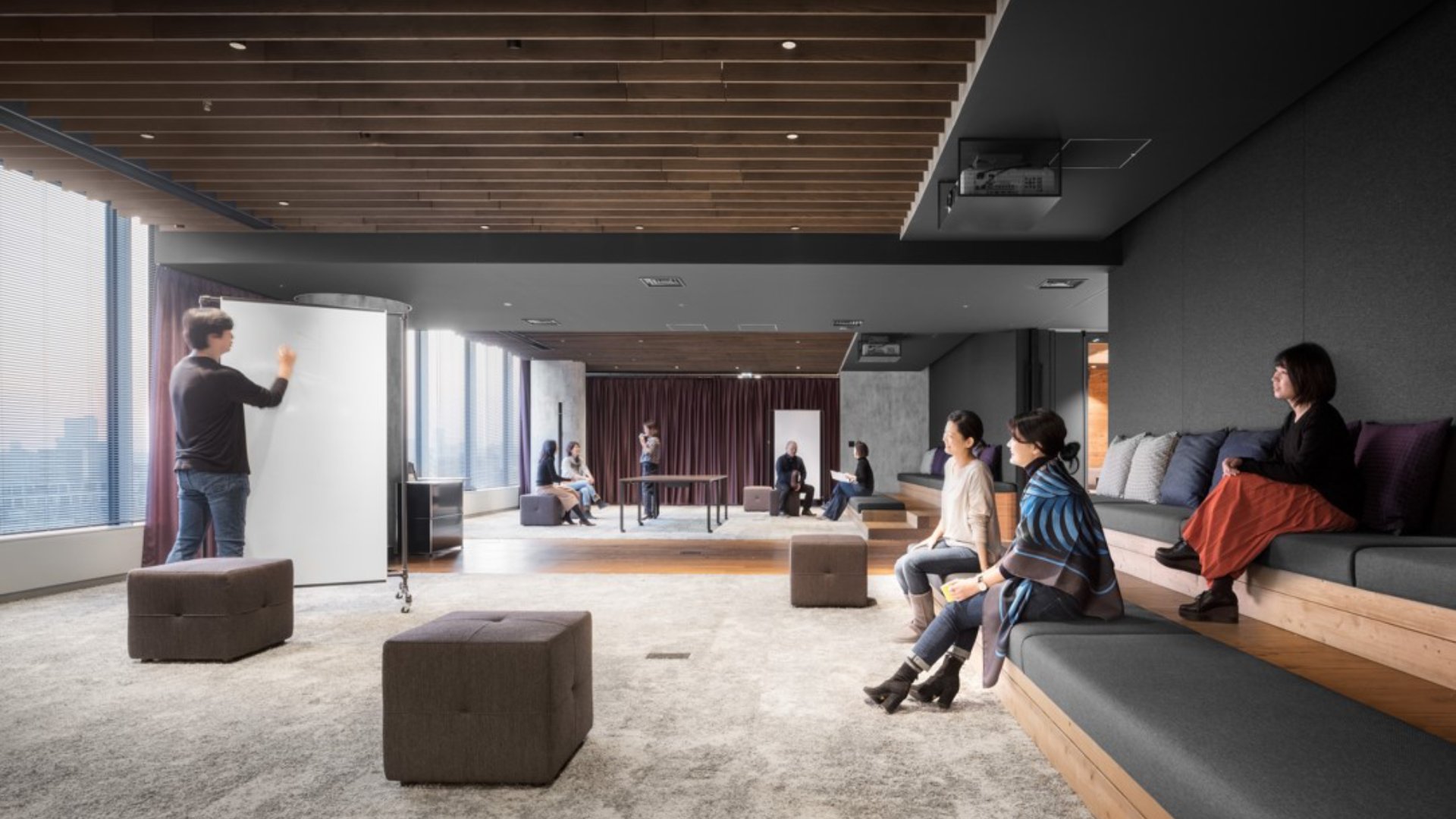 A team having a meeting in the meeting space of the office